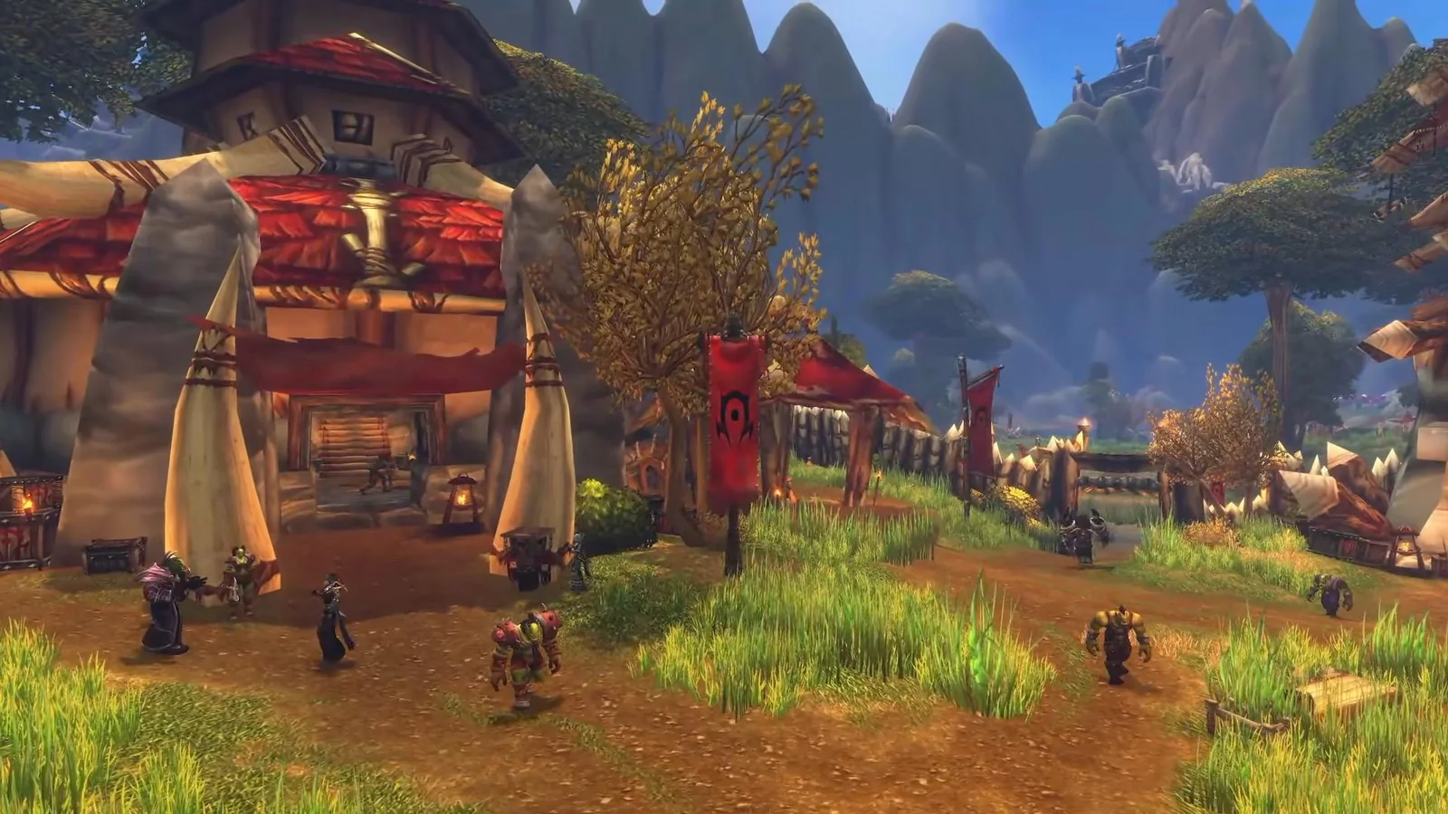 Horde banners, red-roofed buildings and characters in a mountainous settlement shown in Forever reveal coverage.